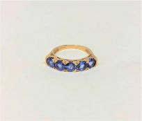 A 9ct gold tanzanite five stone ring, size N CONDITION REPORT: 2.