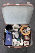 A luggage case containing boxed Royal Crown Derby dish, Royal Worcester vases, Aynsley mantel clock,