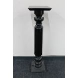 A Victorian ebonised plant stand