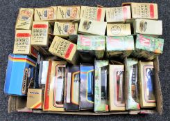A box of die cast vehicles including Matchbox,