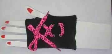 A box of 144 pairs of lady's skull gloves with pink laces