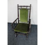 An early 20th century child's American style rocking chair