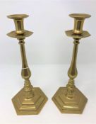 A good quality pair of Arts and Crafts style brass candlesticks.