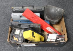 A box of cased socket sets, welder mask,