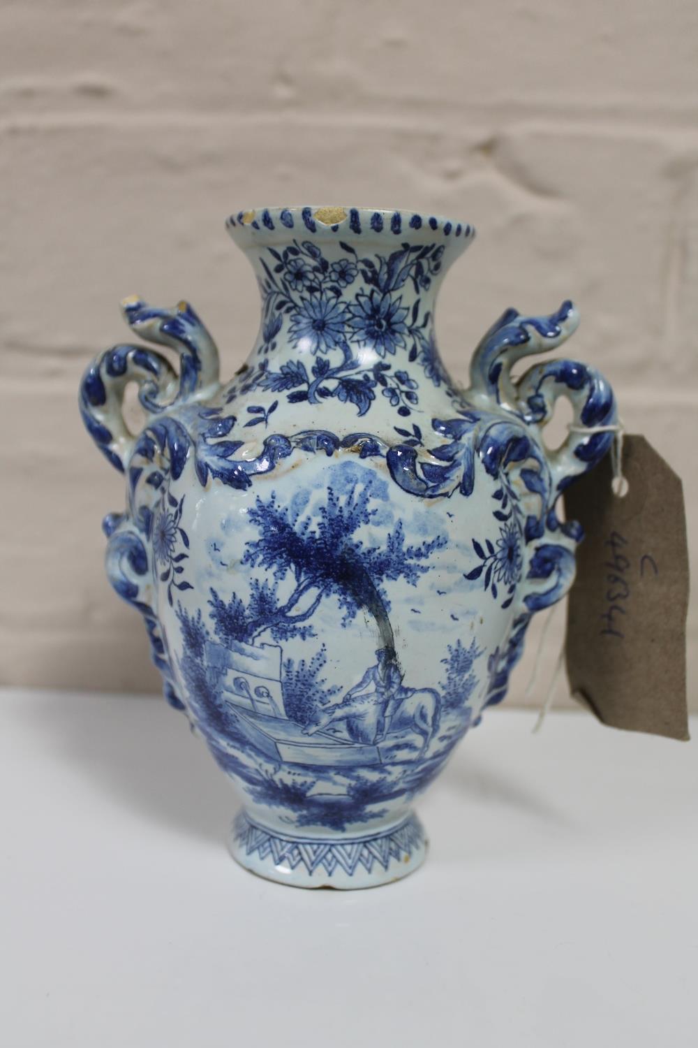 An 18th century Delft pottery blue and white vase