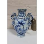 An 18th century Delft pottery blue and white vase