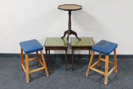 A leather topped wine table,