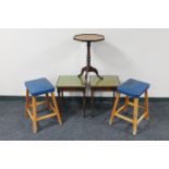 A leather topped wine table,