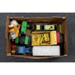 A box of mid 20th century Tonka Trucks and farm vehicles