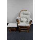 A Kub beech framed gilder chair with stool