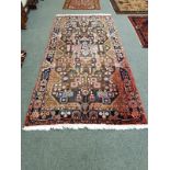 A Persian Nahavand rug 147 cm x 300 cm