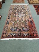 A Persian Nahavand rug 147 cm x 300 cm