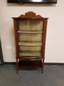 An Edwardian inlaid mahogany display cabinet,