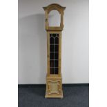 A blond oak longcase clock case