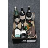 A box of five late 20th century bottles of port and a assorted alcohol miniatures including Baileys,
