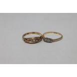 Two 18ct gold three stone and five stone diamond rings (2)