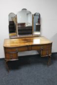 A 1930's mahogany dressing table with triple mirror
