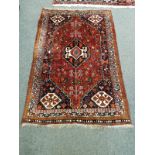 An antique Kashgai rug 117 cm x 175 cm