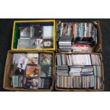 Four boxes of assorted DVD's and CD's