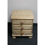 A stripped Ducal pine bedside chest