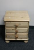 A stripped Ducal pine bedside chest