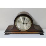 A 1930's oak cased mantel clock