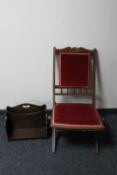 An Edwardian mahogany folding chair upholstered in a pink dralon together with an Edwardian oak