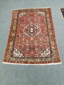 A Persian Brojerd rug 112 cm x 150 cm