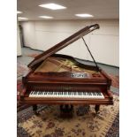 A mahogany cased boudoir grand piano by Gebruder Knake, length 210 cm,