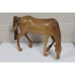 A wooden figure of a horse