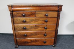 A Victorian mahogany six drawer chest with pillar column supports