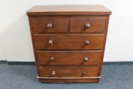 A Victorian mahogany and pine five drawer chest