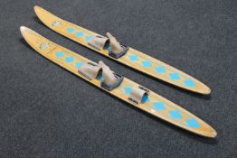 A pair of vintage Mercury water skis