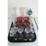 A tray of assorted glass ware : cranberry glass goblet, candlesticks,