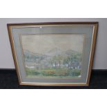 A framed watercolour depicting rural village scene