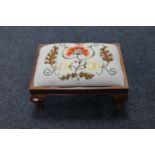 A mahogany tapestry footstool