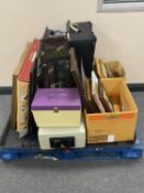 A pallet of plastic car boot tray, pictures, luggage case, fire safe,