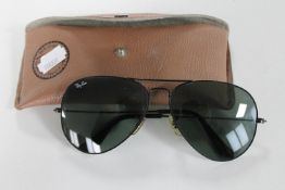 A set of vintage Rayban sunglasses in case