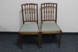 A pair of inlaid mahogany dining chairs