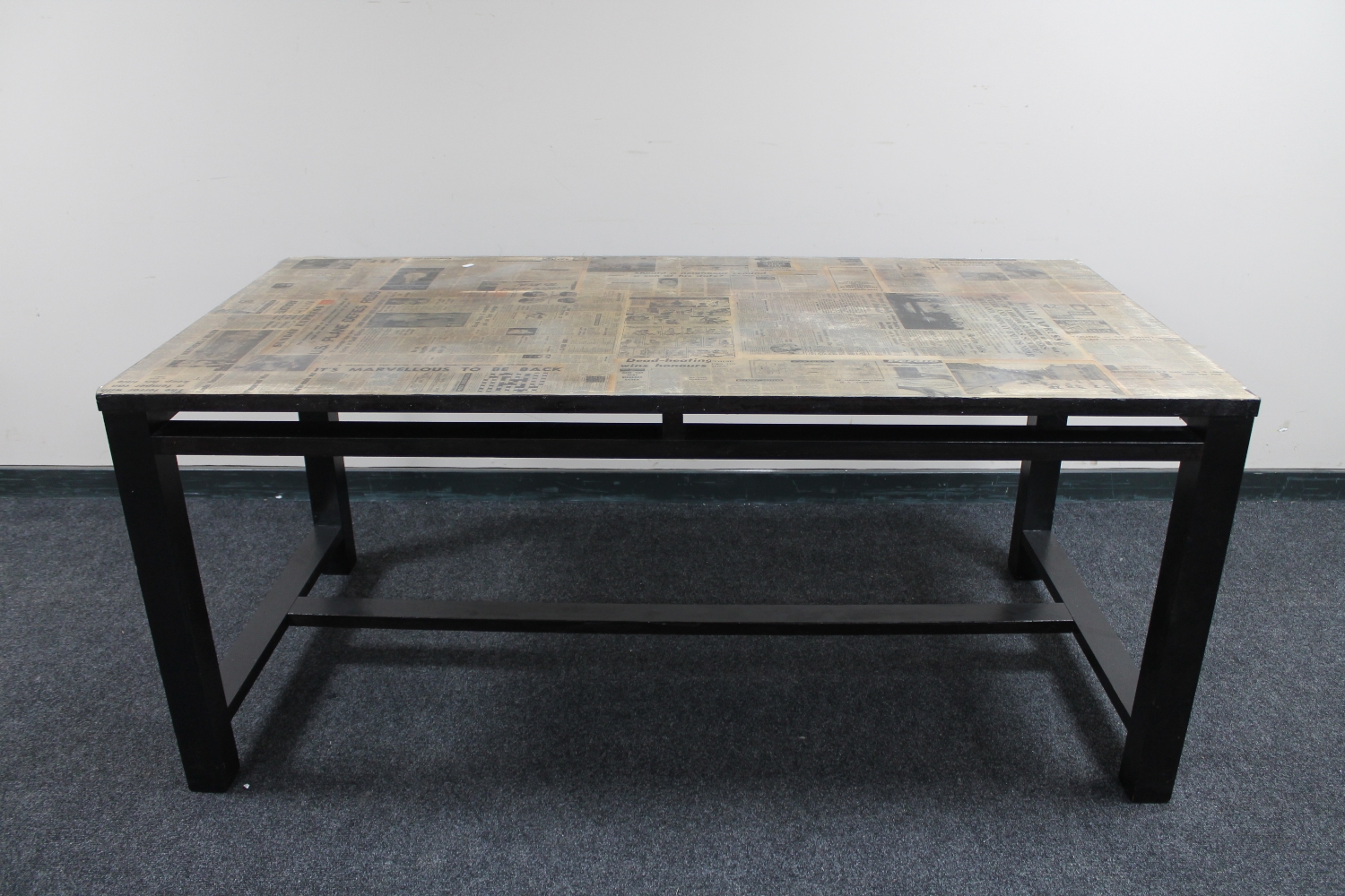 A contemporary dining table with 'newspaper' top CONDITION REPORT: 170cm long by