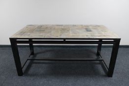A contemporary dining table with 'newspaper' top CONDITION REPORT: 170cm long by