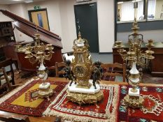 An impressive ormolu mounted marble and spelter three piece clock garniture CONDITION