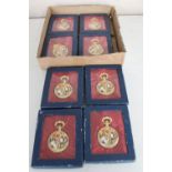 A box of eight decorative pocket watches