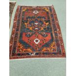 An antique Kurdish rug 146 cm x 210 cm