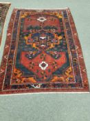 An antique Kurdish rug 146 cm x 210 cm