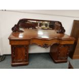 A Victorian mahogany mirror backed serpentine fronted twin pedestal sideboard, width 197 cm.