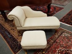 A miniature chaise longue (length 135 cm) and footstool