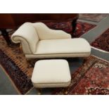 A miniature chaise longue (length 135 cm) and footstool