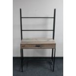 A contemporary metal framed dressing table fitted with a drawer
