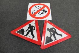 Two framed men at work road signs and a tin no smoking sign